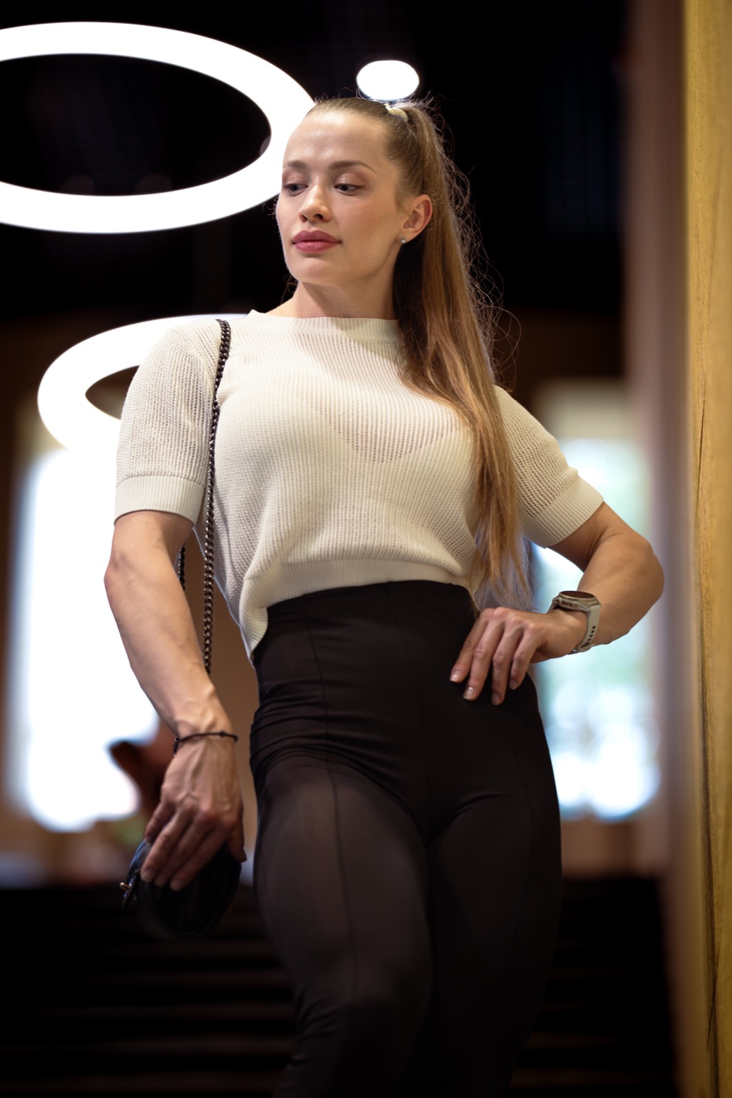 Mariia in a cream top and dark trousers